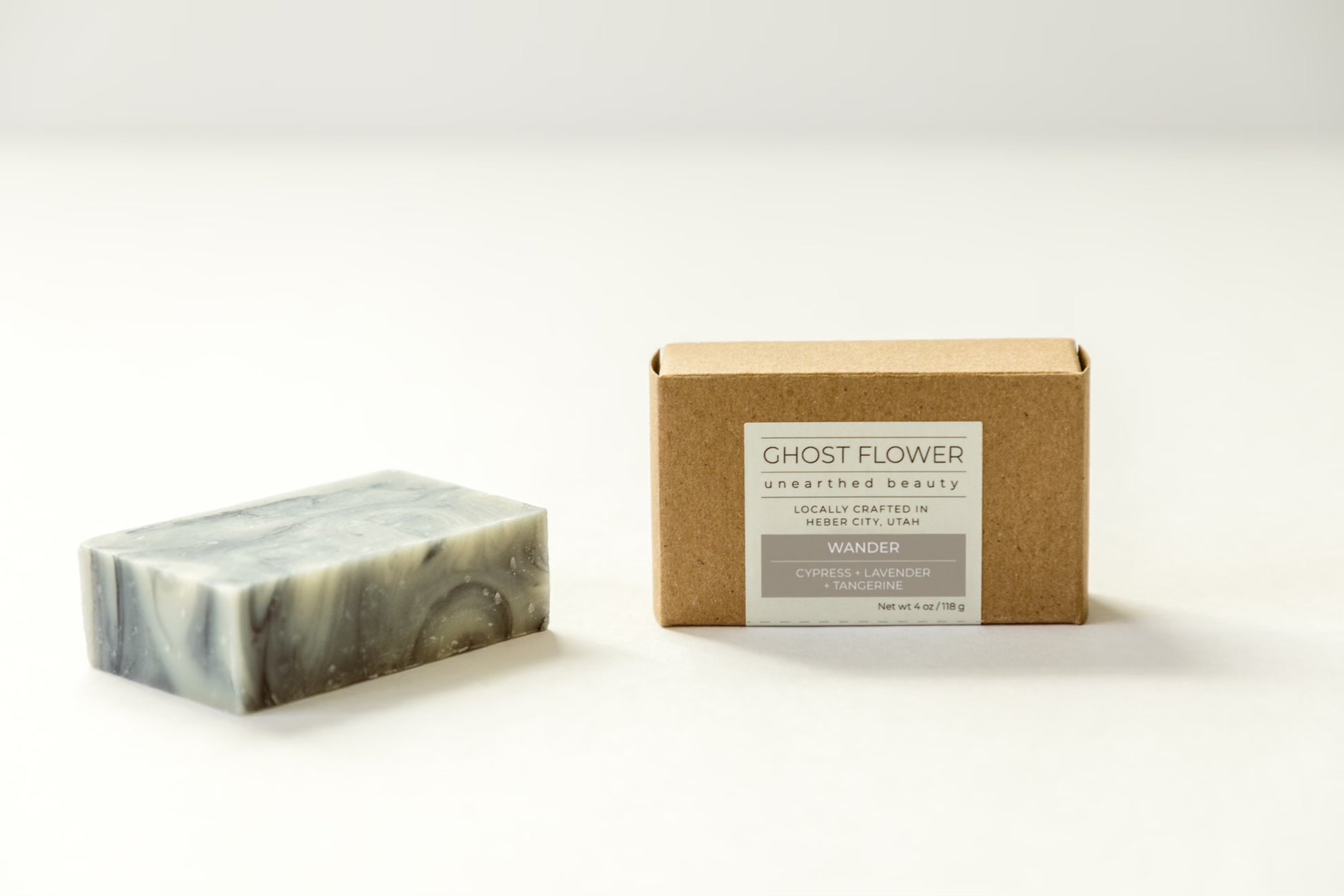 Soap-display-of-handmade-soap-called-wander- with-one-single-bar-next-to-it’s-box-ghost-flower-beauty.heic 